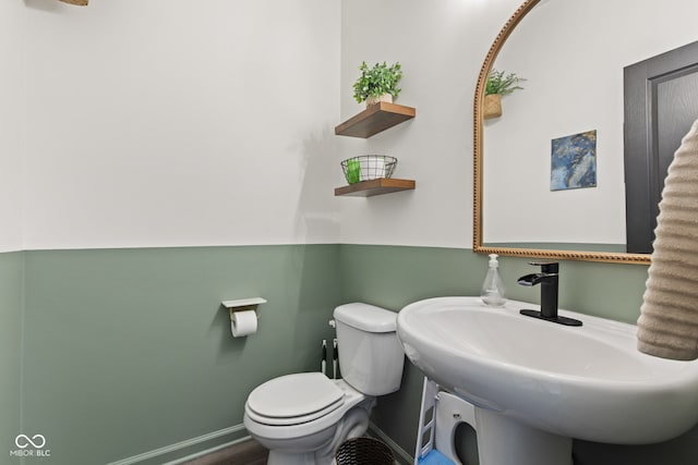 1289 Sunset Blvd, Avon, IN 46123 - bathroom with baseboards, toilet, and a sink