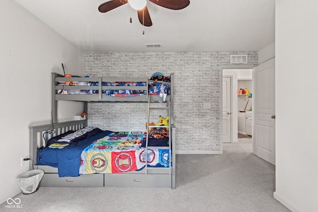 1289 Sunset Blvd, Avon, IN 46123 - carpeted bedroom featuring baseboards, ceiling fan, brick wall, and washer / clothes dryer