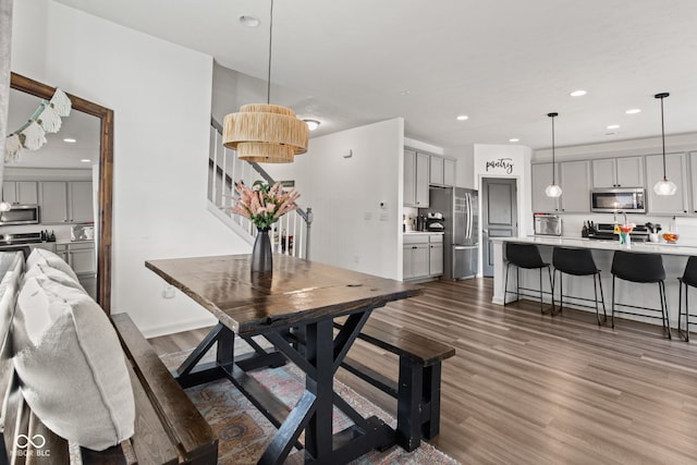 1289 Sunset Blvd, Avon, IN 46123 - dining space with wood finished floors, stairway, and recessed lighting