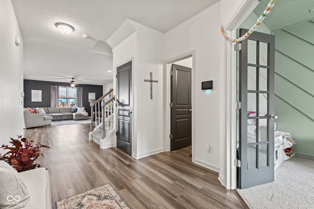 1289 Sunset Blvd, Avon, IN 46123 - hallway with stairs, wood finished floors, and baseboards