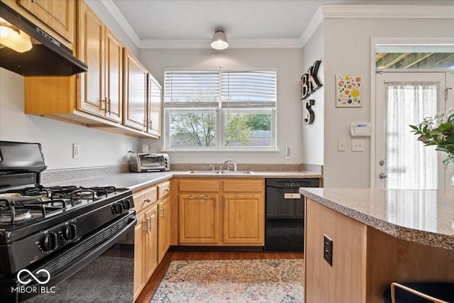 2405 N Park Ave, Indianapolis, IN 46205 - kitchen featuring black appliances, under cabinet range hood, a sink, wood finished floors, and crown molding