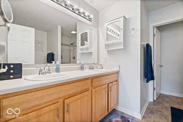 2405 N Park Ave, Indianapolis, IN 46205 - full bath featuring a stall shower, double vanity, and baseboards