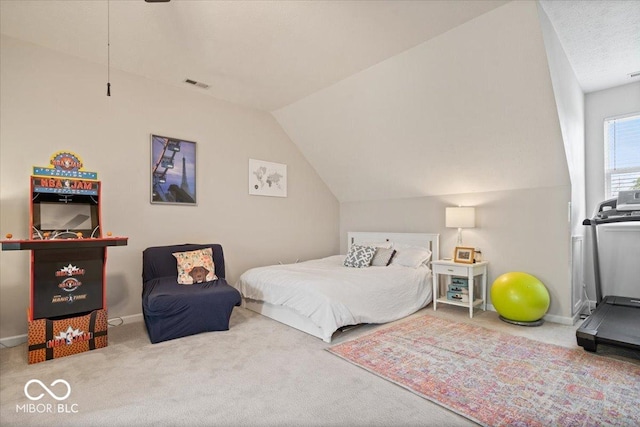 2405 N Park Ave, Indianapolis, IN 46205 - carpeted bedroom featuring vaulted ceiling and baseboards