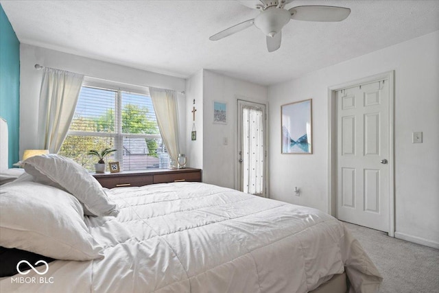2405 N Park Ave, Indianapolis, IN 46205 - carpeted bedroom featuring ceiling fan and a textured ceiling