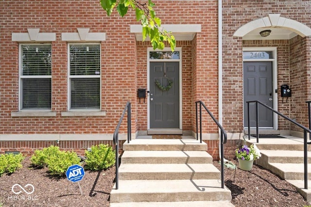 2405 N Park Ave, Indianapolis, IN 46205 - doorway to property featuring brick siding