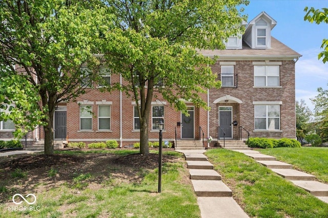 2405 N Park Ave, Indianapolis, IN 46205 - multi unit property with brick siding and a front lawn