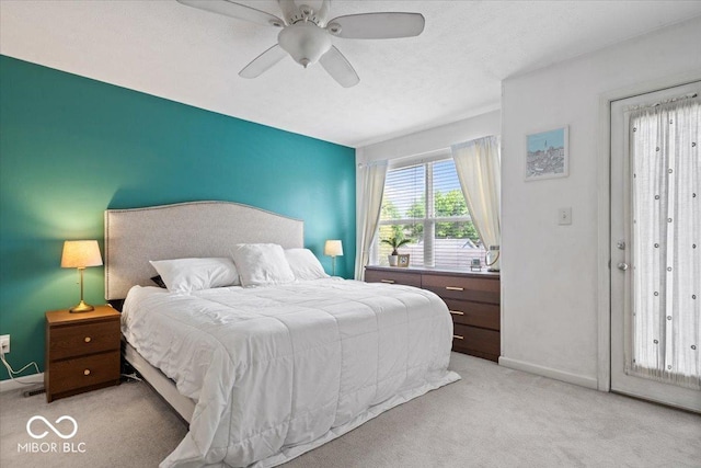 2405 N Park Ave, Indianapolis, IN 46205 - bedroom with light colored carpet, baseboards, and ceiling fan