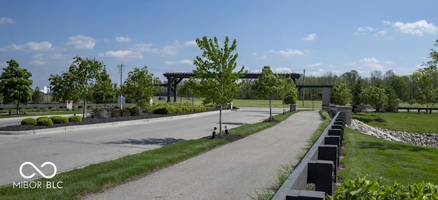 surrounding community with a yard