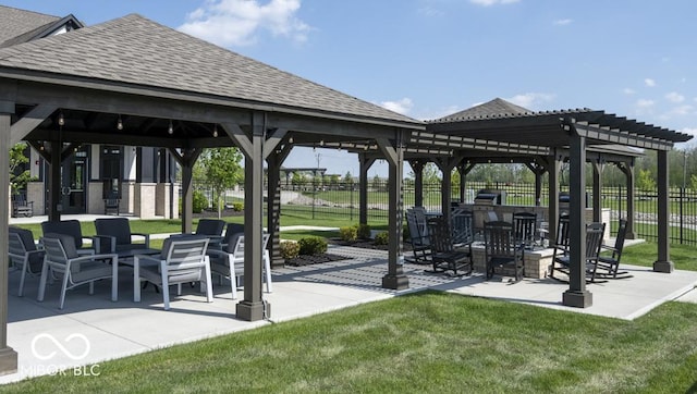 view of home's community featuring a gazebo, a pergola, and a patio area