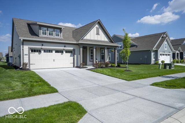 view of front facade with driveway, covered porch, a front lawn, board and batten siding, and roof with shingles