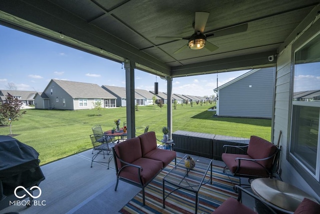 view of patio featuring a residential view, an outdoor hangout area, a ceiling fan, and grilling area