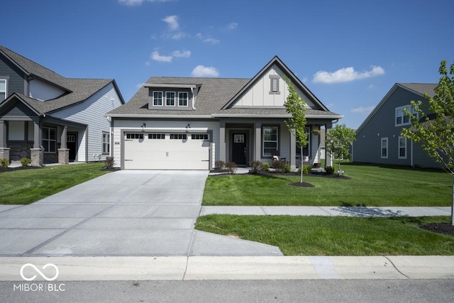 craftsman house featuring a garage, a front yard, concrete driveway, and a porch