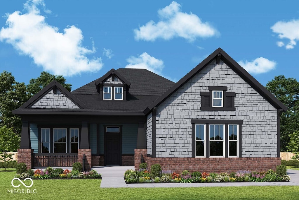 11467 Selsey Rd, Fishers, IN 46040 - craftsman house with a front lawn, covered porch, and brick siding