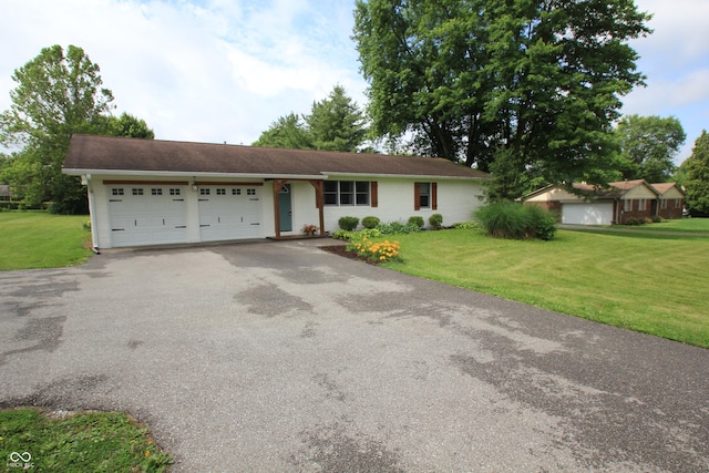 2237 W 100 N, Greenfield, IN 46140 - single story home with a garage, asphalt driveway, and a front yard