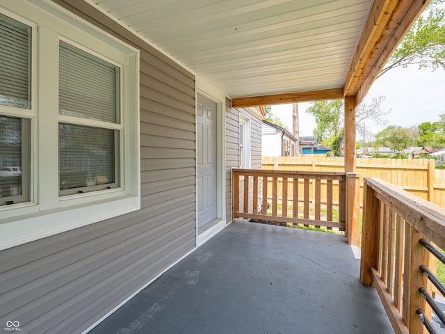 view of patio / terrace featuring fence