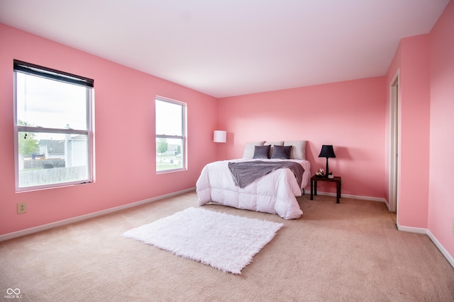 1404 Norton Dr, Greenwood, IN 46143 - bedroom with light colored carpet and baseboards