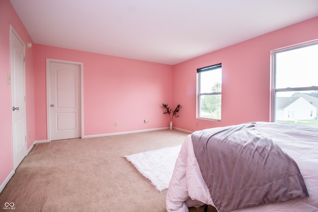 1404 Norton Dr, Greenwood, IN 46143 - bedroom featuring light colored carpet and baseboards