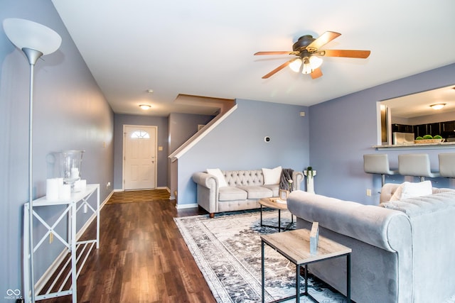 1404 Norton Dr, Greenwood, IN 46143 - living area with a ceiling fan, wood finished floors, and baseboards