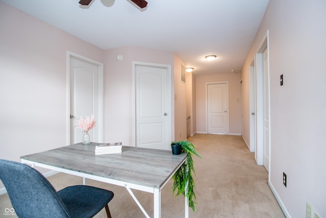 1404 Norton Dr, Greenwood, IN 46143 - home office featuring light carpet, ceiling fan, and baseboards