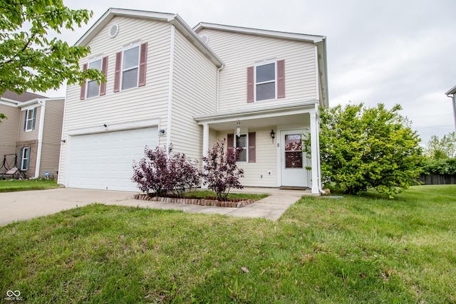 1404 Norton Dr, Greenwood, IN 46143 - traditional home with an attached garage, concrete driveway, and a front lawn
