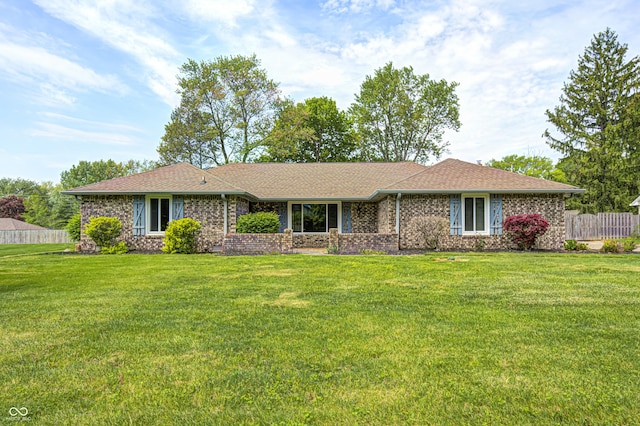 101 N Westbury Rd, Pendleton, IN 46064 - ranch-style house with a front yard, a shingled roof, and brick siding