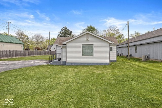 1391 N Shadeland Ave, Indianapolis, IN 46219 - back of property featuring roof with shingles