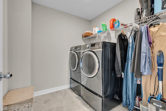 3546 Brampton Ln, Westfield, IN 46074 - washroom featuring washer and clothes dryer and baseboards