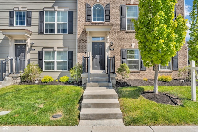 3546 Brampton Ln, Westfield, IN 46074 - property entrance with brick siding and a lawn