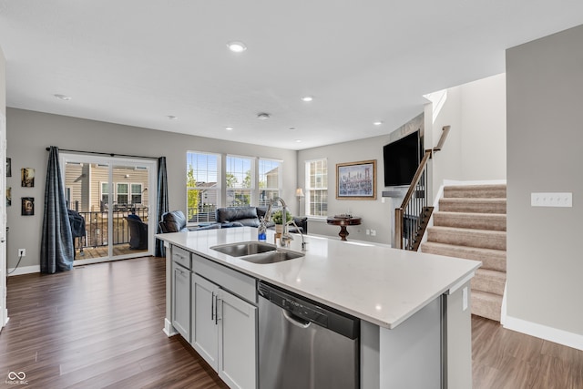 3546 Brampton Ln, Westfield, IN 46074 - kitchen featuring a sink, stainless steel dishwasher, open floor plan, dark wood-type flooring, and recessed lighting