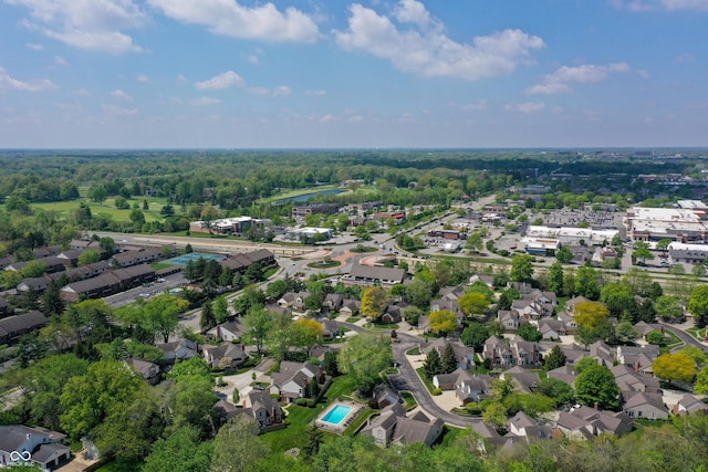 aerial view of property's location featuring nearby suburban area