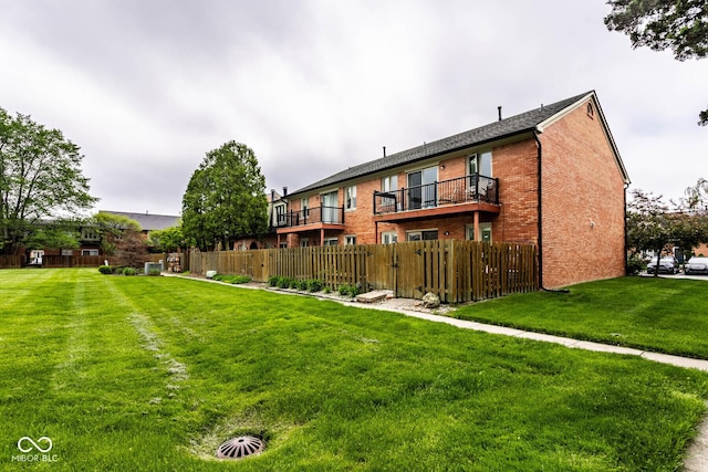 1142 Canterbury Sq S Unit B, Indianapolis, IN 46260 - rear view of house with brick siding and a balcony