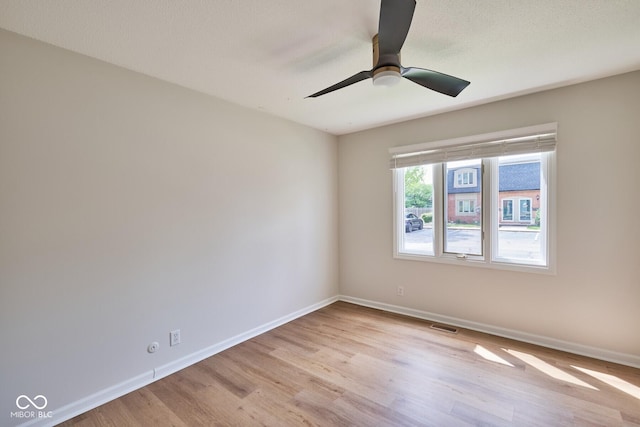 1142 Canterbury Sq S Unit B, Indianapolis, IN 46260 - empty room with baseboards, light wood finished floors, and ceiling fan