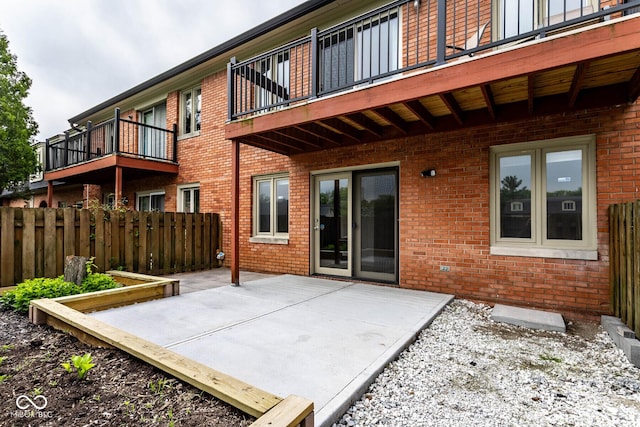 1142 Canterbury Sq S Unit B, Indianapolis, IN 46260 - view of patio / terrace featuring fence and a balcony