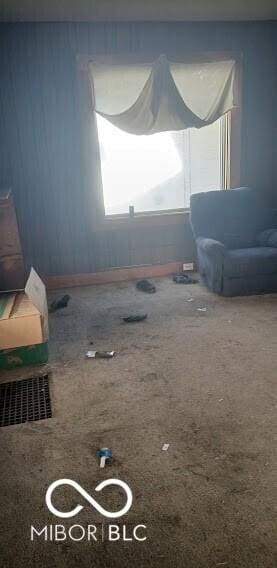 living area with carpet