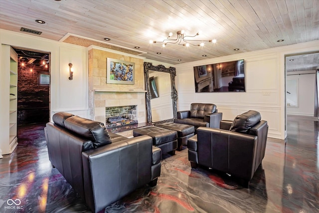 living room with crown molding, a decorative wall, wooden ceiling, a chandelier, and a tile fireplace