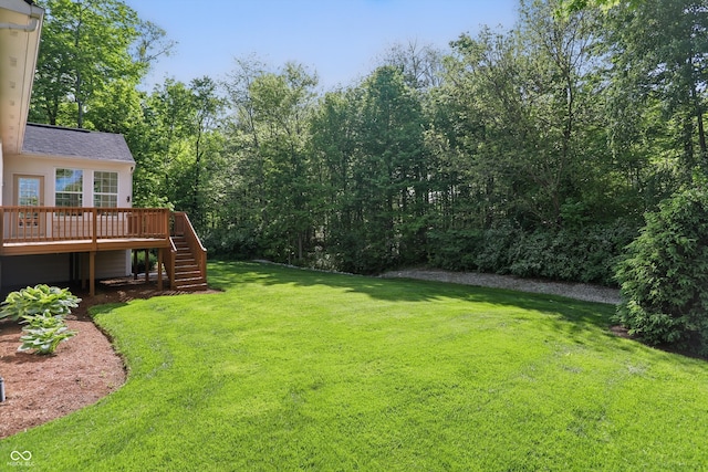 12065 Gray Eagle Dr, Fishers, IN 46037 - view of grassy yard featuring stairway and a wooden deck