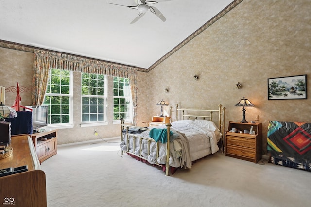12065 Gray Eagle Dr, Fishers, IN 46037 - carpeted bedroom featuring vaulted ceiling, wallpapered walls, a ceiling fan, and ornamental molding