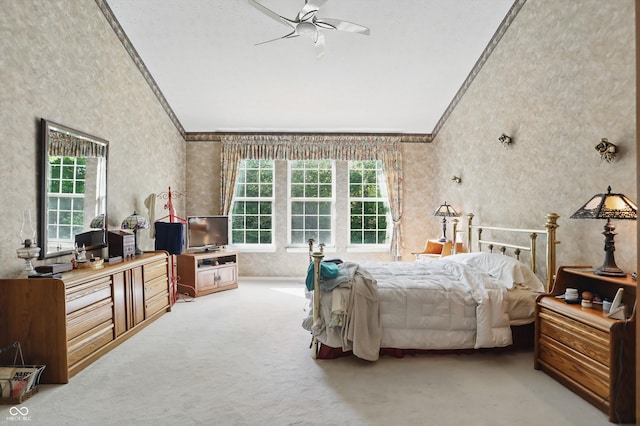 12065 Gray Eagle Dr, Fishers, IN 46037 - carpeted bedroom with lofted ceiling, wallpapered walls, ornamental molding, and multiple windows