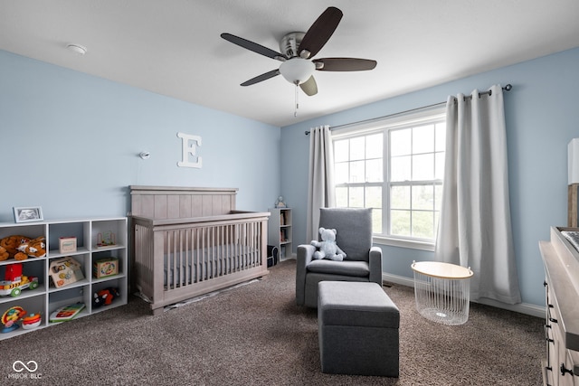 863 N Park Trail Dr, Carmel, IN 46032 - carpeted bedroom with a crib, a ceiling fan, and baseboards