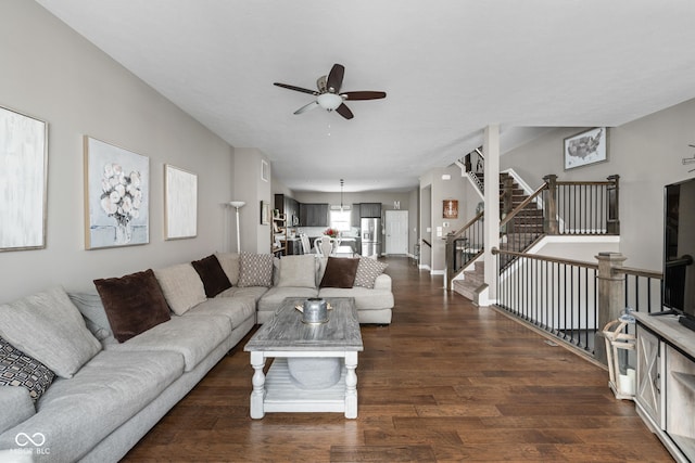 863 N Park Trail Dr, Carmel, IN 46032 - living area with a ceiling fan, dark wood-style floors, and stairway