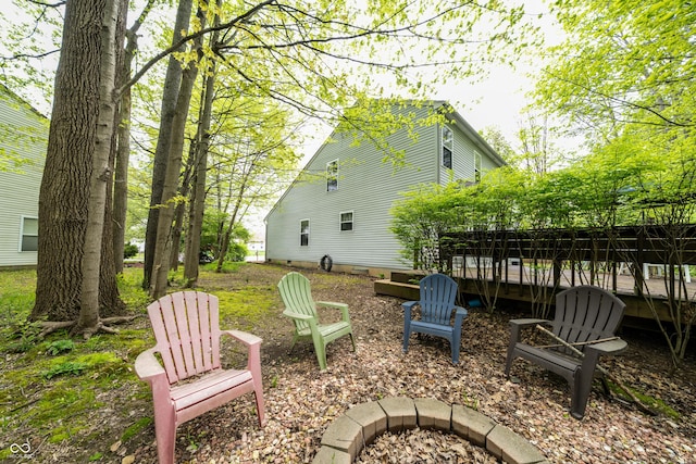 1334 Legacy Ct, Indianapolis, IN 46234 - view of yard with an outdoor fire pit and a wooden deck