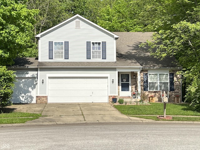 1334 Legacy Ct, Indianapolis, IN 46234 - view of front of house featuring brick siding, driveway, a garage, a front yard, and roof with shingles