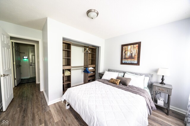 1334 Legacy Ct, Indianapolis, IN 46234 - bedroom with wood finished floors, baseboards, and a closet