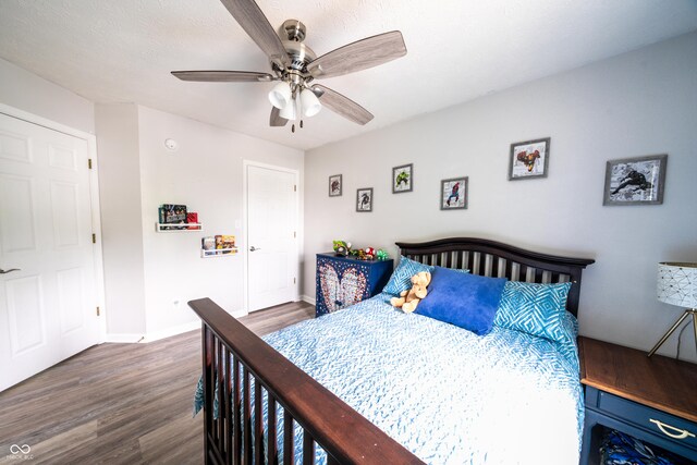 1334 Legacy Ct, Indianapolis, IN 46234 - bedroom featuring wood finished floors, baseboards, and a ceiling fan