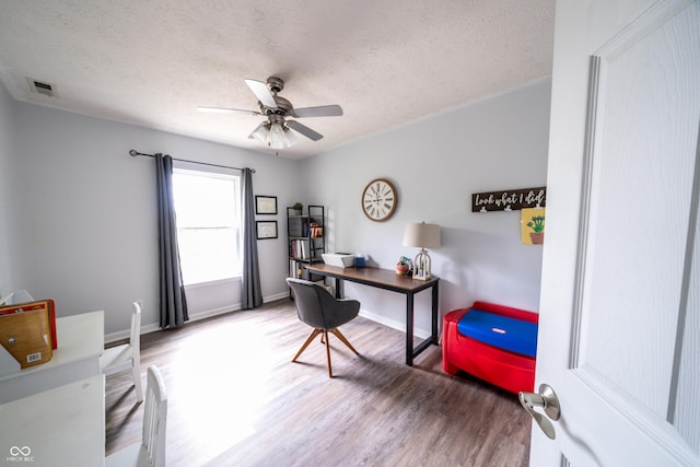 1334 Legacy Ct, Indianapolis, IN 46234 - office area featuring a ceiling fan, wood finished floors, a textured ceiling, and baseboards