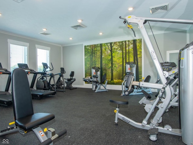exercise room with ornamental molding, recessed lighting, and baseboards