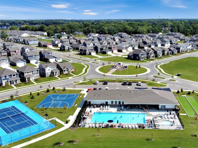aerial perspective of suburban area with a pool area