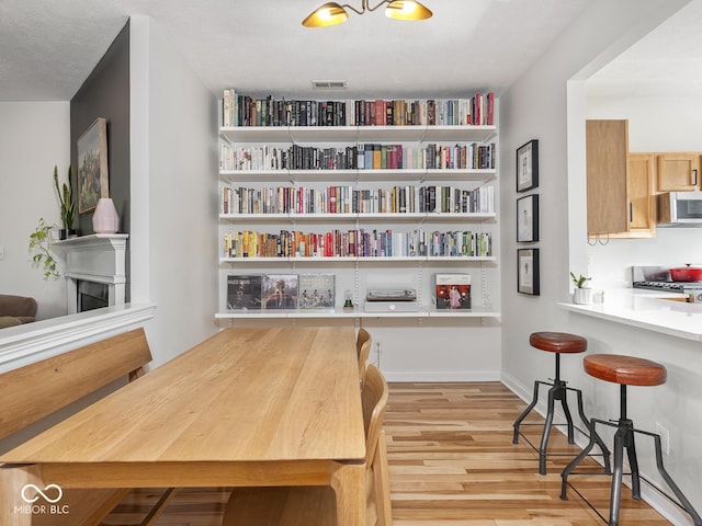 dining room featuring light wood-type flooring