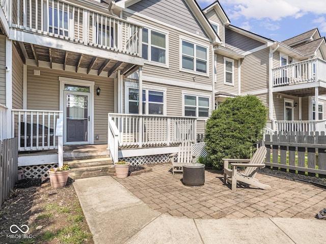 view of patio / terrace with covered porch and a balcony