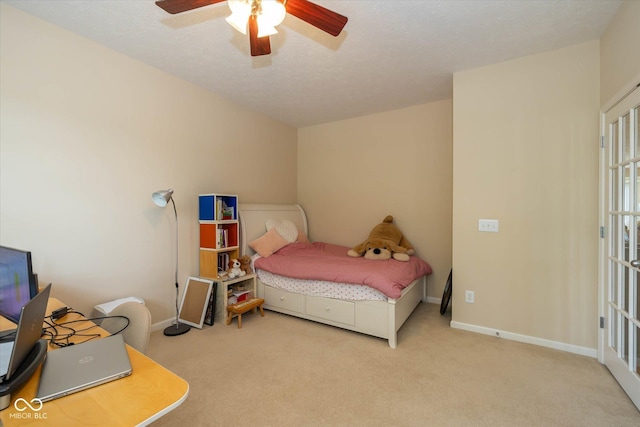 14018 Powder Dr, Carmel, IN 46033 - carpeted bedroom with baseboards, ceiling fan, and a desk